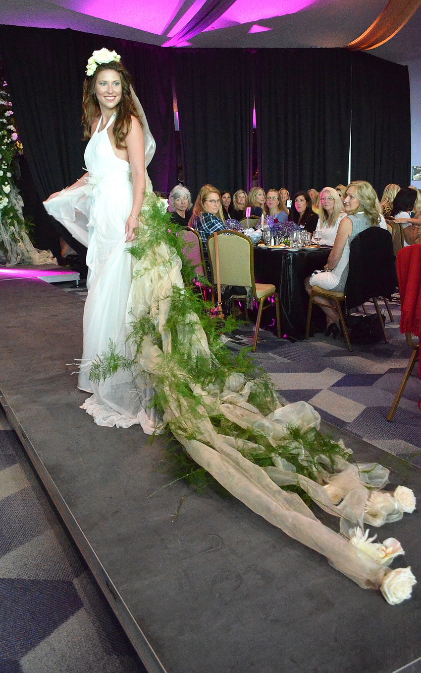 Chelsea Turley models a creation by her mother, designer Karen Roth, from her Karen Roth Eco-luxe Resort & Loungewear line.