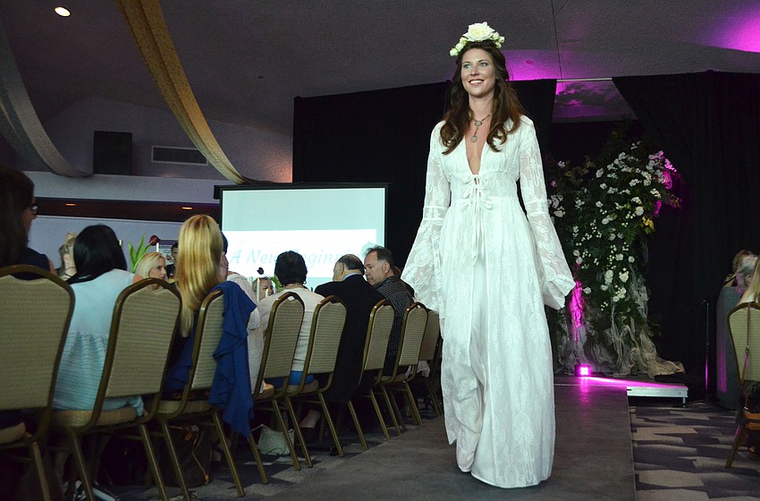 Chelsea Turley models a creation by her mother, designer Karen Roth, from her Karen Roth Eco-luxe Resort & Loungewear line.