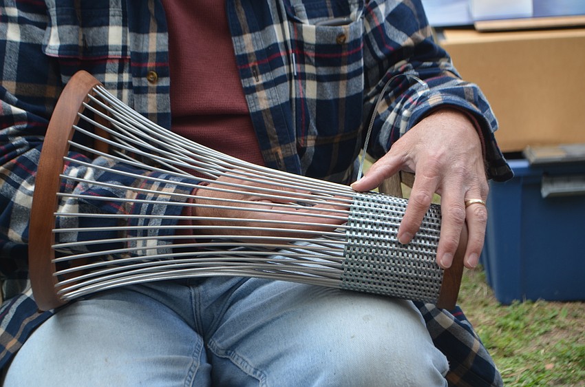 James Mosler makes a vessel out of aluminum. He was one of more than 175 artists who displayed work at St. Armands Circle over the weekend.