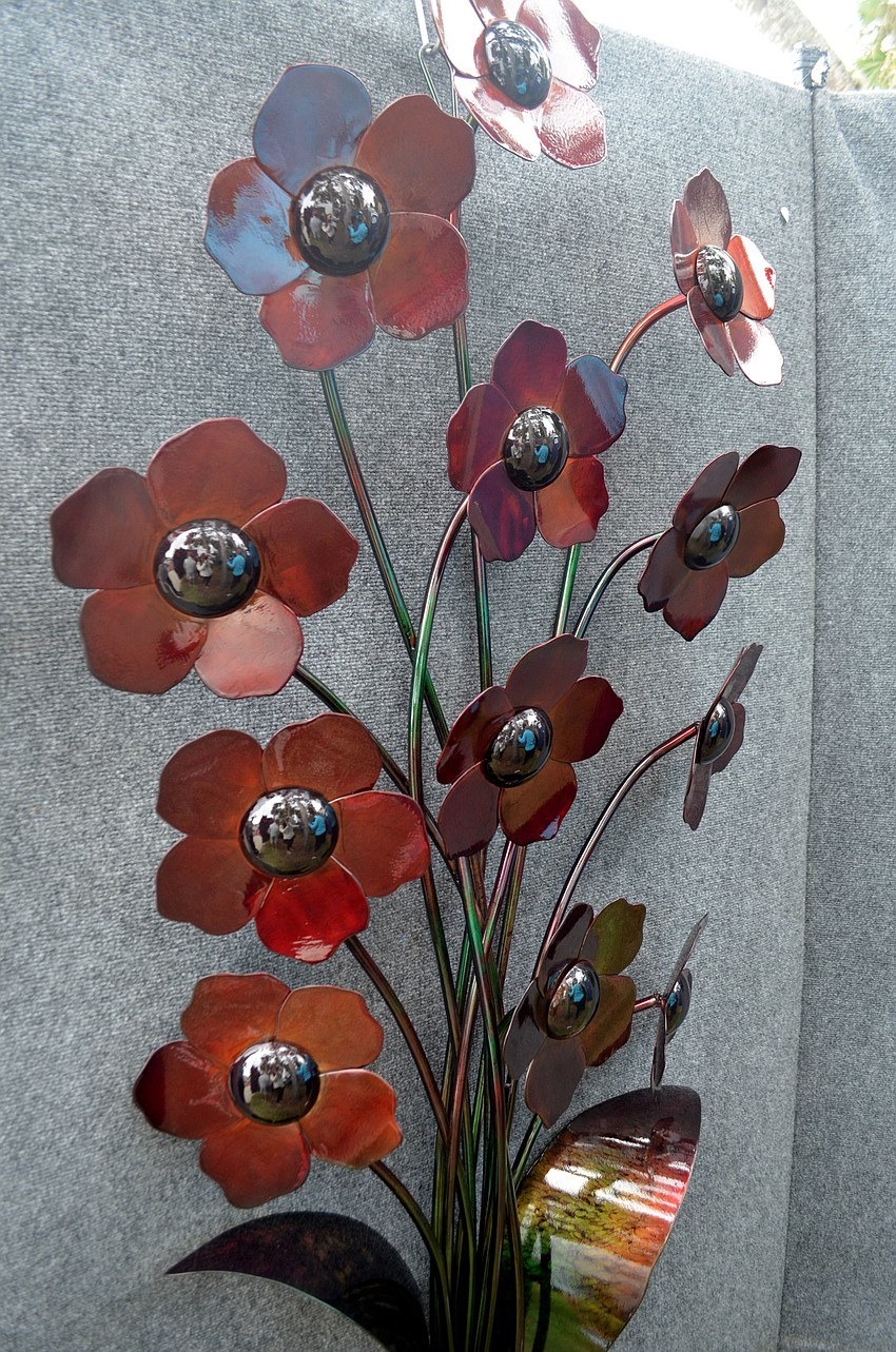 Steel Alive works hung around St. Armands Circle for the annual Winter Art Festival. The pieces are created by Courtney and Rommel Ricaurte.