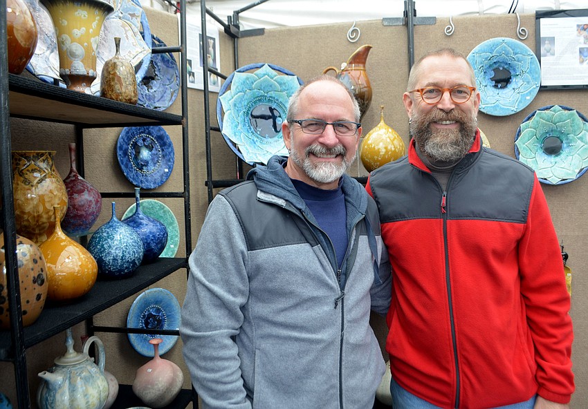 Keith Herbrand and Glenn Woods of Pottery Boys Clay Studios were two of more than 175 artists who displayed work at St. Armands Circle over the weekend.