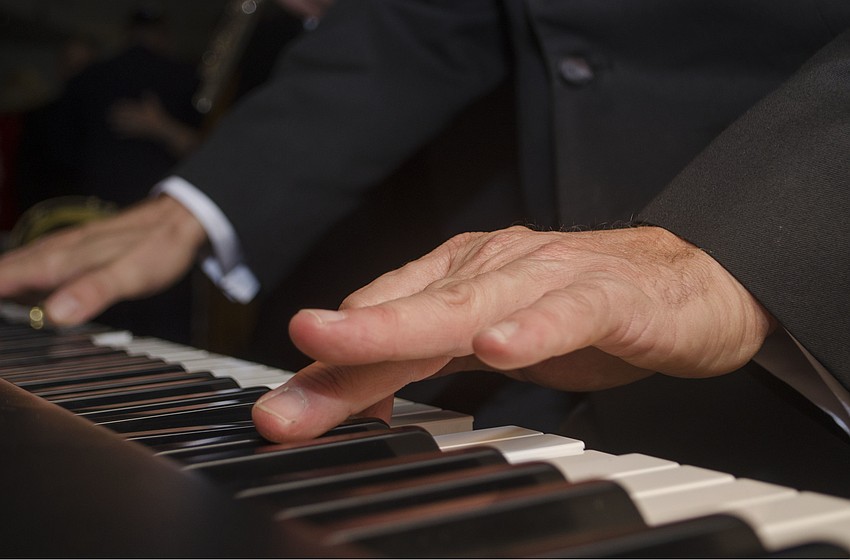 Guests were greeted by the sounds of jazz pianist Tony Castellano Jr.