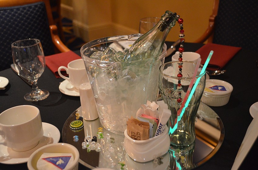 The dining room was decorated to look like a diner. Each table had glow sticks and Coca-Cola glasses in the center.