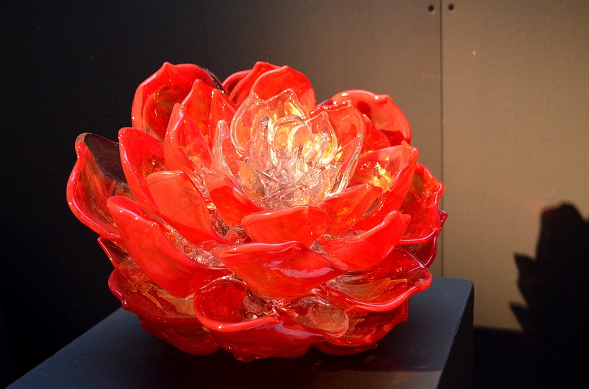 Some of the glass art was on display at a Habatat Pop Up at Whitney Plaza, such as “Brilliant Red Bloom” by Martin Blank