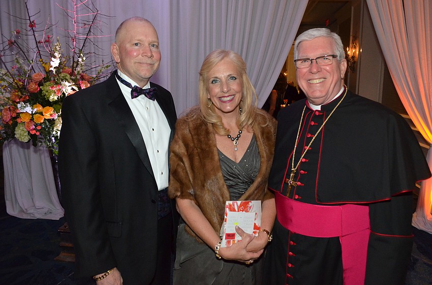 Rick and Michele Tromble with Bishop Frank Dewane