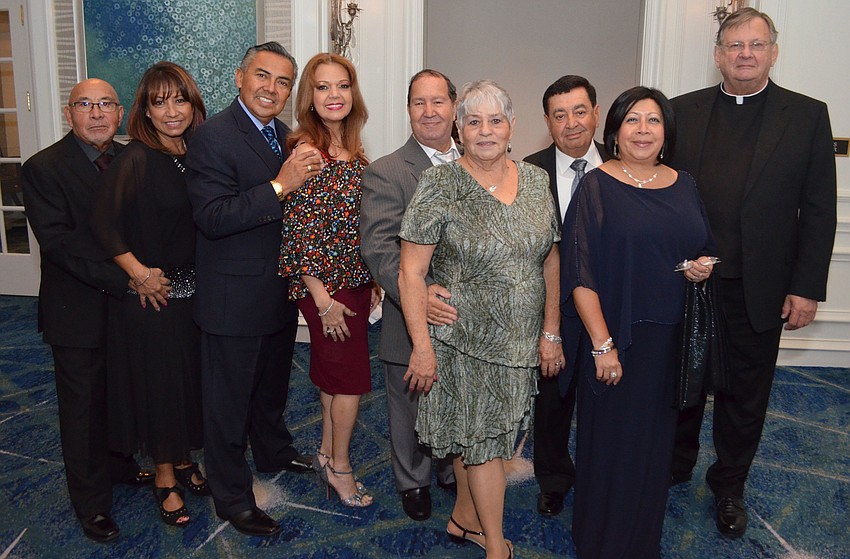 Marco and Marissa Wong, George and Lurdes Galan, Adolfo and Norma Diaz, Angelo and Cecilia Amoresano and Father Phillip Schweda