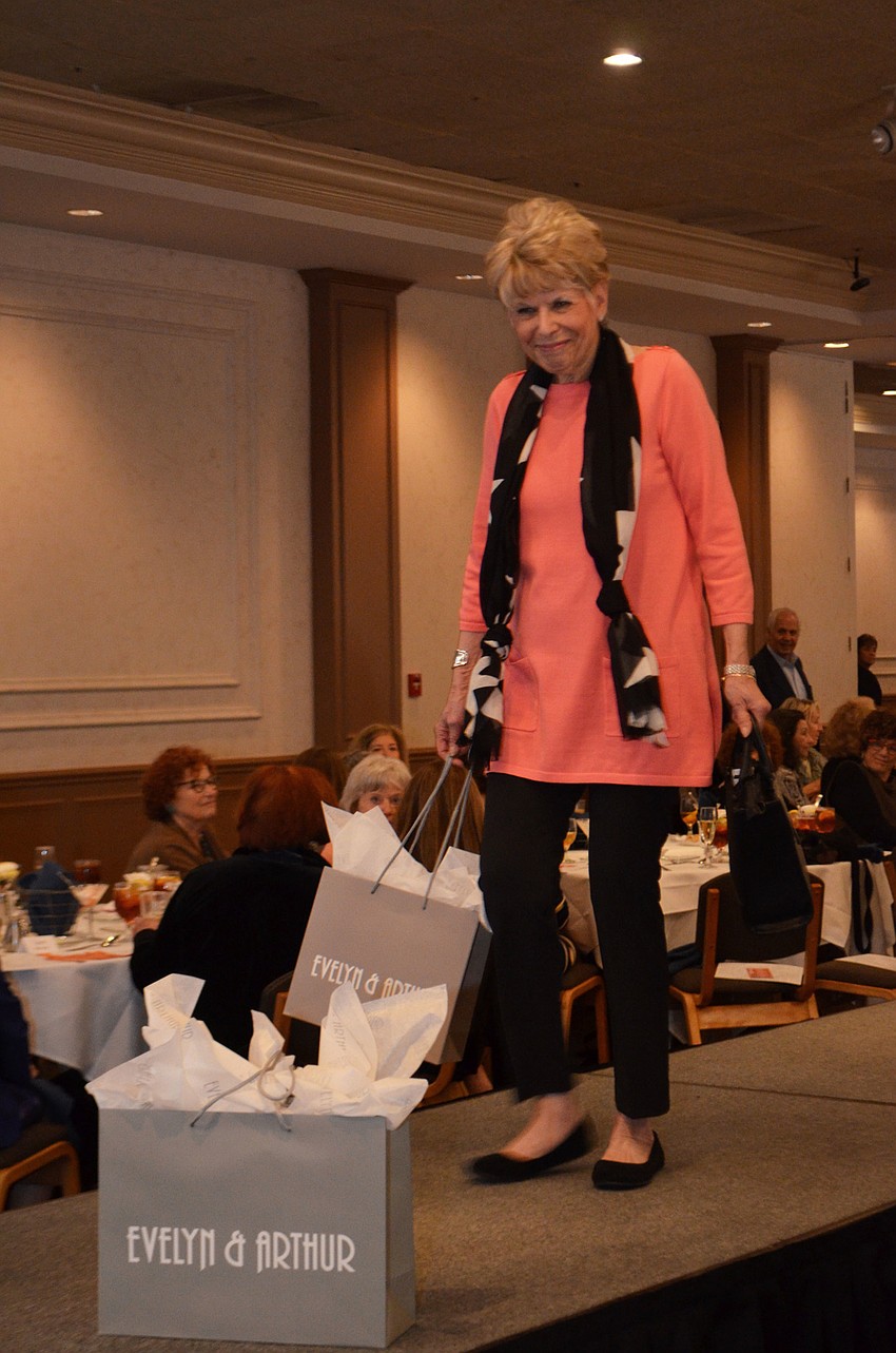 Nancy Cohen smiles as she models a casual outfit from Evelyn & Arthur.