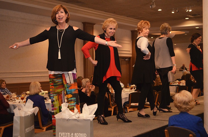 Adrianne Weissman leads the models down one final walk down the runway. All of the clothing came from Evelyn & Arthur.