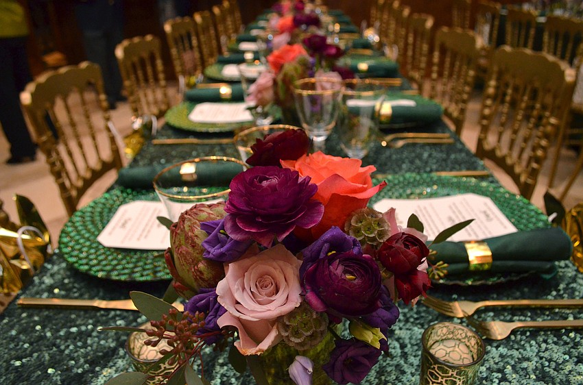The color scheme for the dinner was emerald and gold, which was partially inspired by the color of the artwork and other decor in the Findlay’s penthouse.