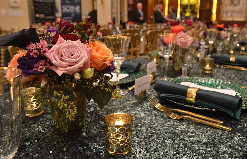The color scheme for the dinner was emerald and gold, which was partially inspired by the color of the artwork and other decor in the Findlay’s penthouse.