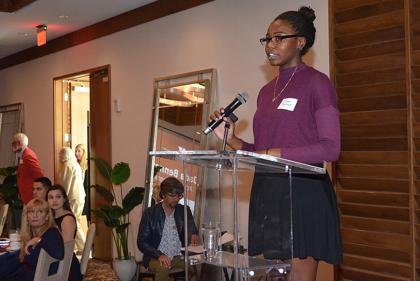 Emcee Jada Bennett addresses the crowd