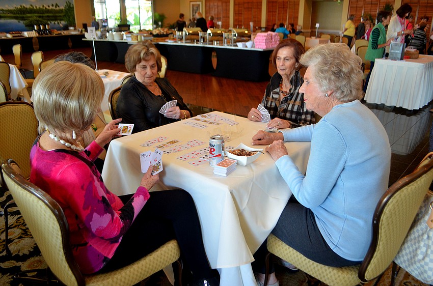 Grace Goldberg, Helene Perretz, Jackie Nusbaum, Marla Levine and Esta Grocer enjoy a game of canasta.