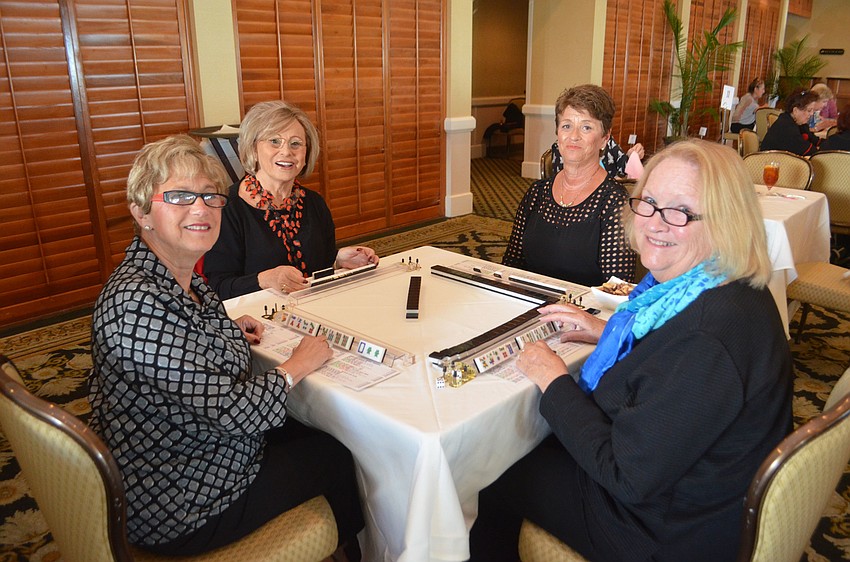 Michele Katz, Tami Shankman, Ronnie Levine and Susan Pariseau play a game of mahjong.
