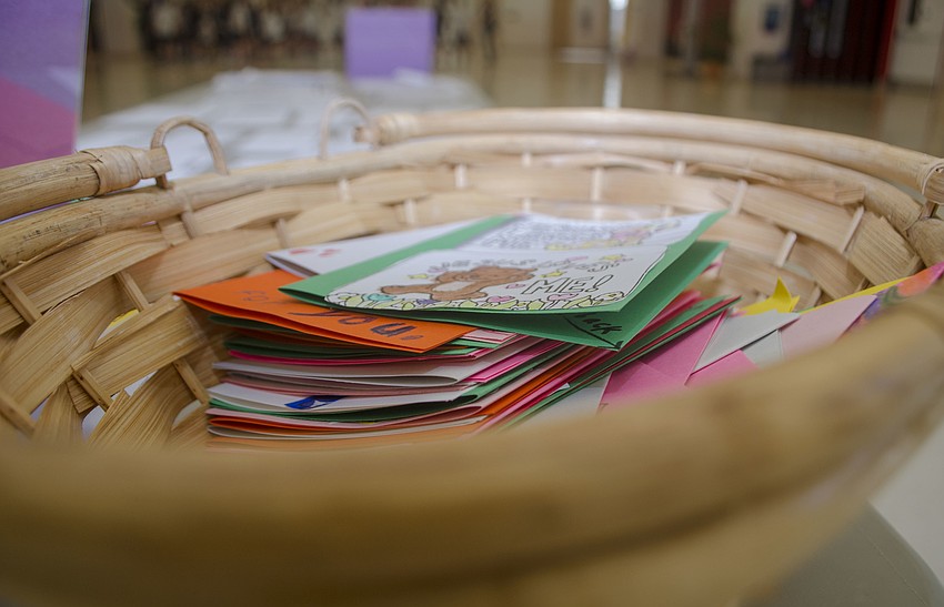 Students made prayer cards during St. Mary Academy and St. Martha Catholic School'   s day of service.