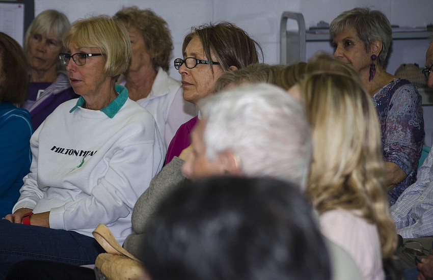The audience watches an abbreviated version of David’s one-woman show, “The Pink Hulk.”