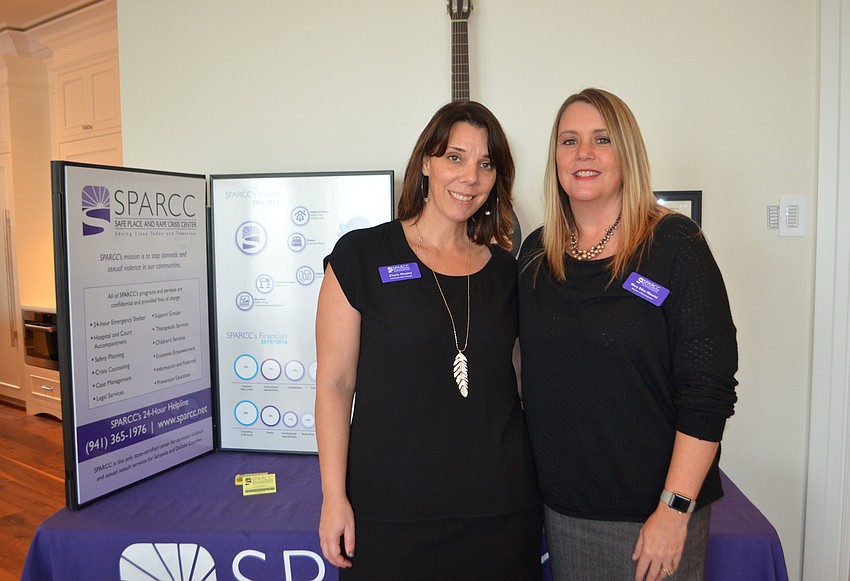 Cherie Heasley and Mary Ellen Mancini of SPARCC, which was the charitable introduction of the evening.