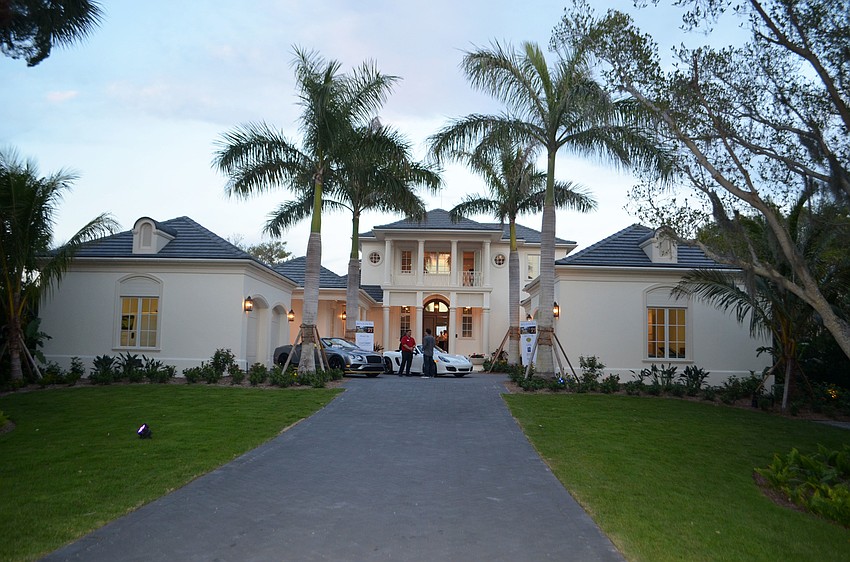 The approximately one-acre estate, located on Gulf of Mexico Drive, overlooks the Sarasota Bay and has five bedrooms and five-and-a-half baths.