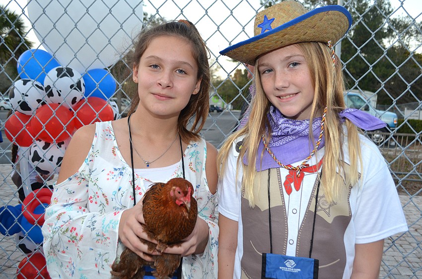 Chloe J. and Alex H. enjoy the petting zoo.