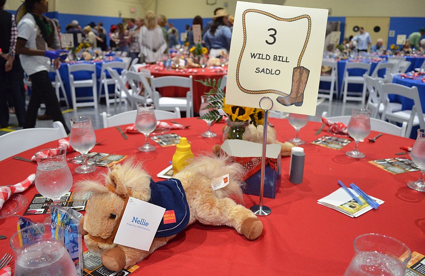 Guests at Steak and Burger were told to follow the dress code of “western casual” — which carried through in the decor inside the gymnasium — for the event at Lee Wetherington Club on Feb. 3.