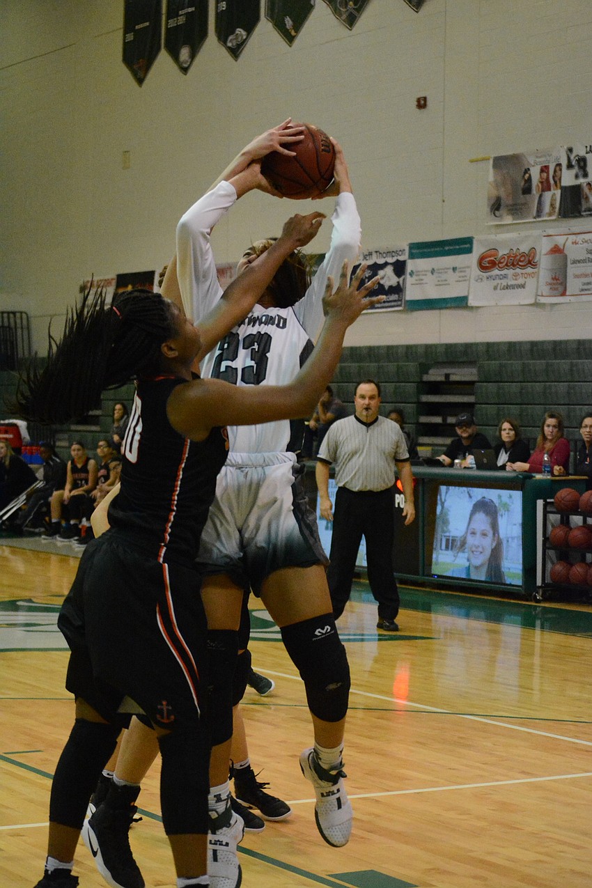 Senior LaDazhia Williams gets fouled by Sarasota.
