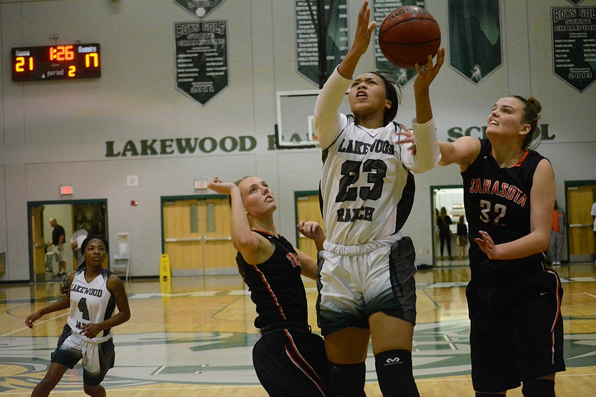 Senior LaDazhia Williams gets an inside bucket.