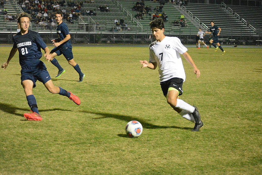 Ricky Yanez takes the ball upfield.