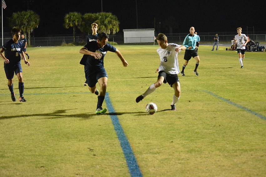 Sam Stapleton-Jones fakes out a Palm Harbor University defender.