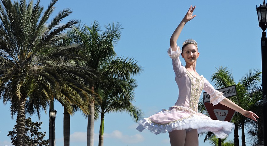 Sarah Shaw, 15, blends into the streetscape on Lakewood Main Street.