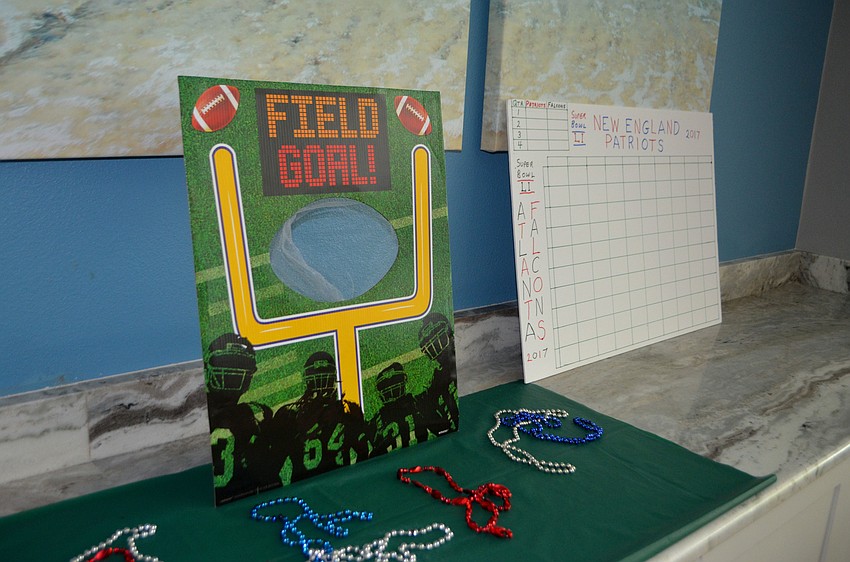 Members gathered after the Sunday morning service for a Super Bowl lunch.