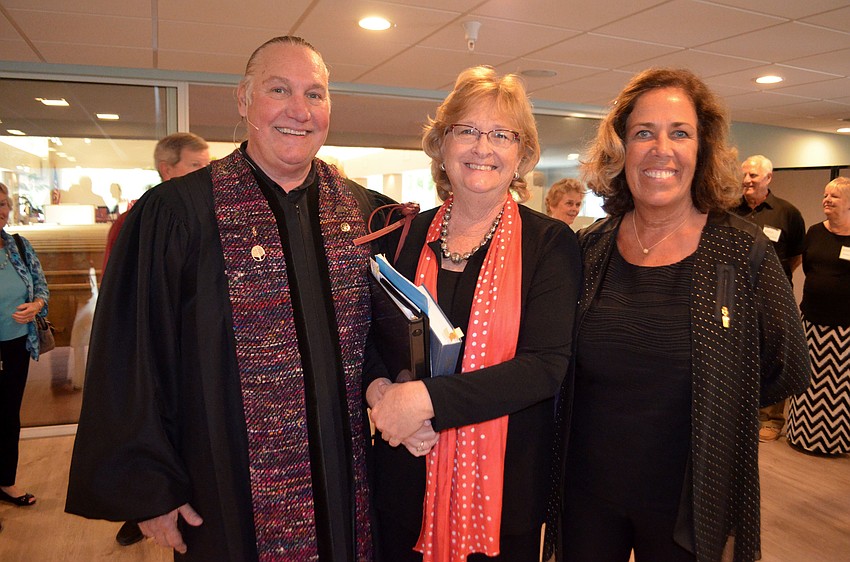The Rev. Bill Friederich, music director Bonnie Wolfgram and Bah Hero