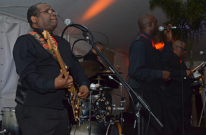 Members of Pocket Change perform.