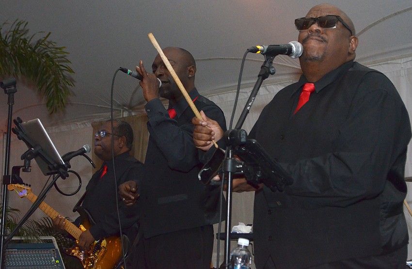 Members of Pocket Change perform.