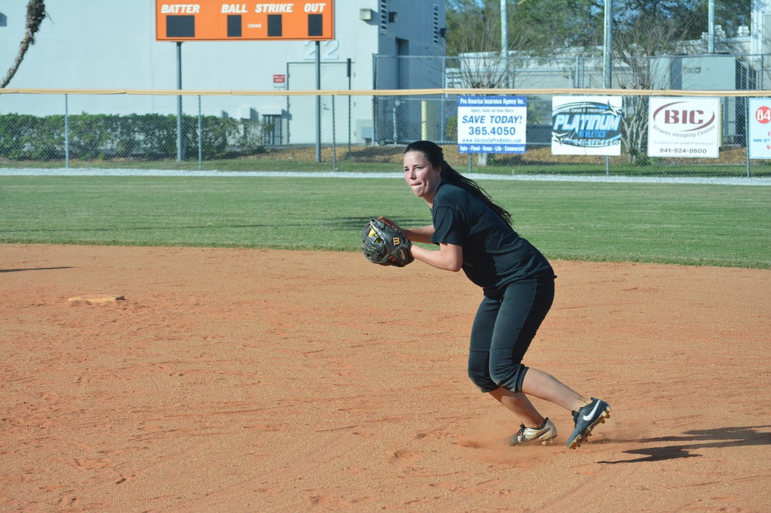 Hannah Roberson readies a throw to first.