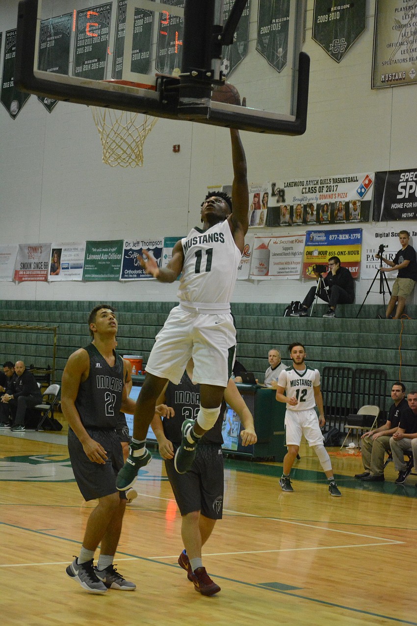 Senior Blauvelt Georges gets a free layup.