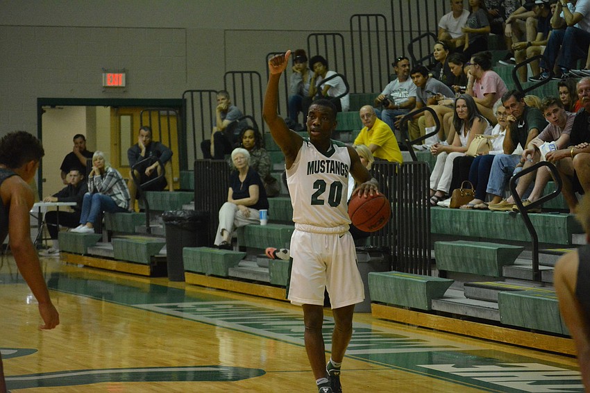 Senior Devin Twenty calls a play.