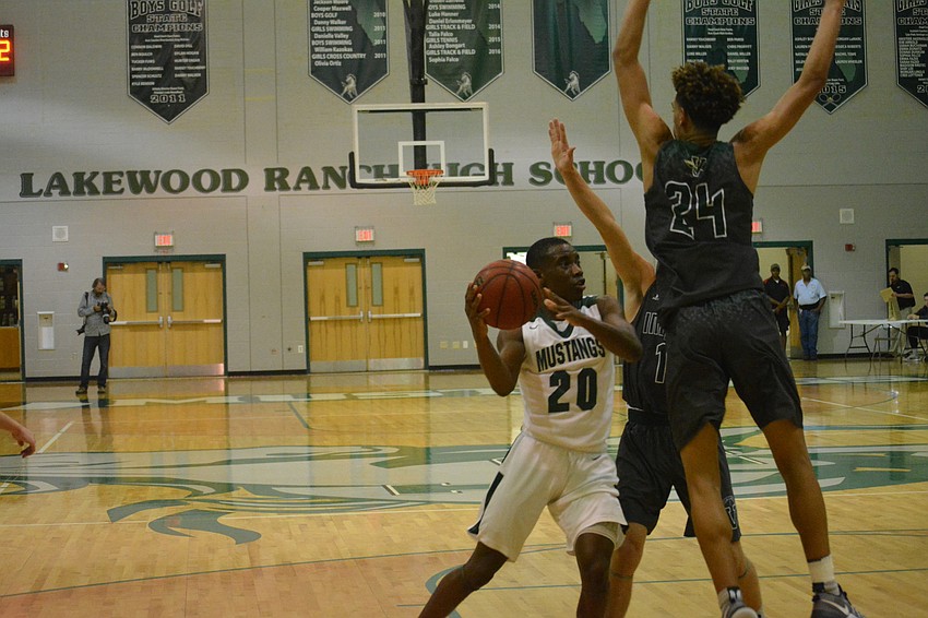 Senior Devin Twenty looks for an open man.