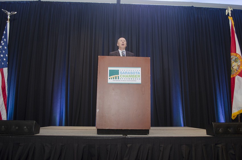 Greater Sarasota Chamber of Commerce board member Mark Pritchett introduces guest speaker Wendy Walker