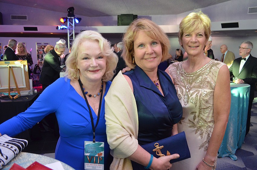 Monica Van Buskirk, president of the Van Wezel Foundation, with Loretta Luhman and Cathy Hansell