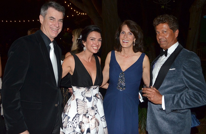 Chris and Aimee Cogan with Sean and Melanie Natarajan