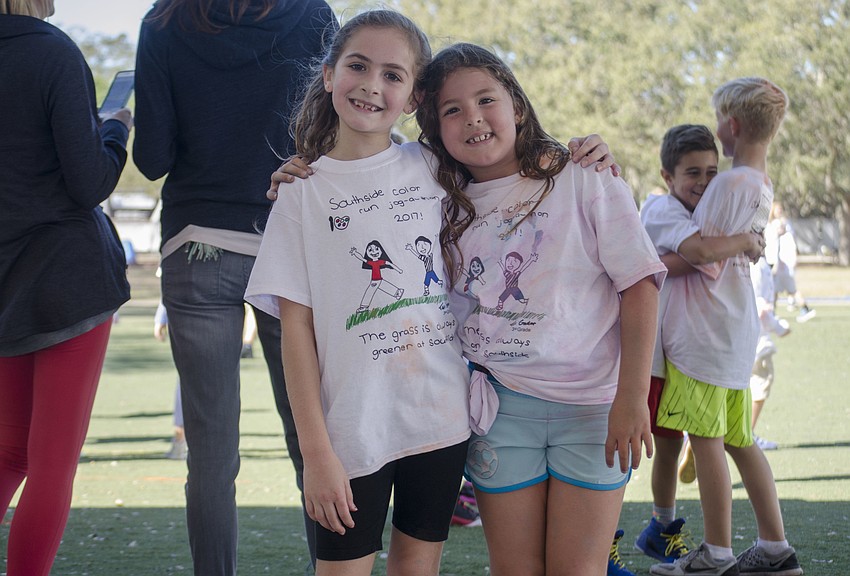 Lisa Collier and Addison Kaufman pose after finishing the jog-a-thon.