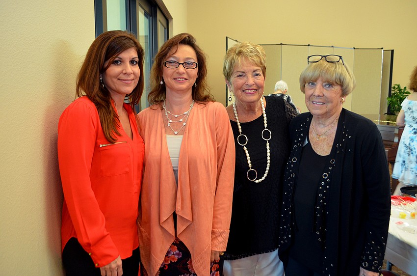 Deanna Vanacore, Irina LaRose, Pat Mock and Pat Fairris of Design 2000, who did all of the models’ hair for the event.
