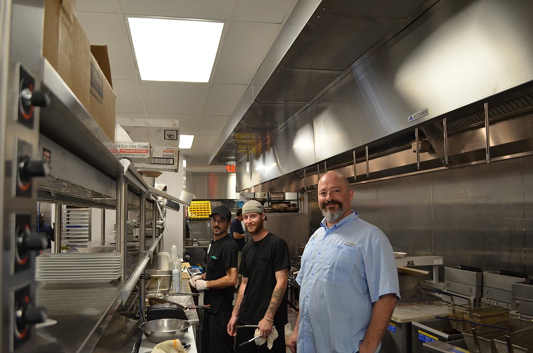 (John McGuire) Chef Rich Demarse shows off his new Mar Vista kitchen.