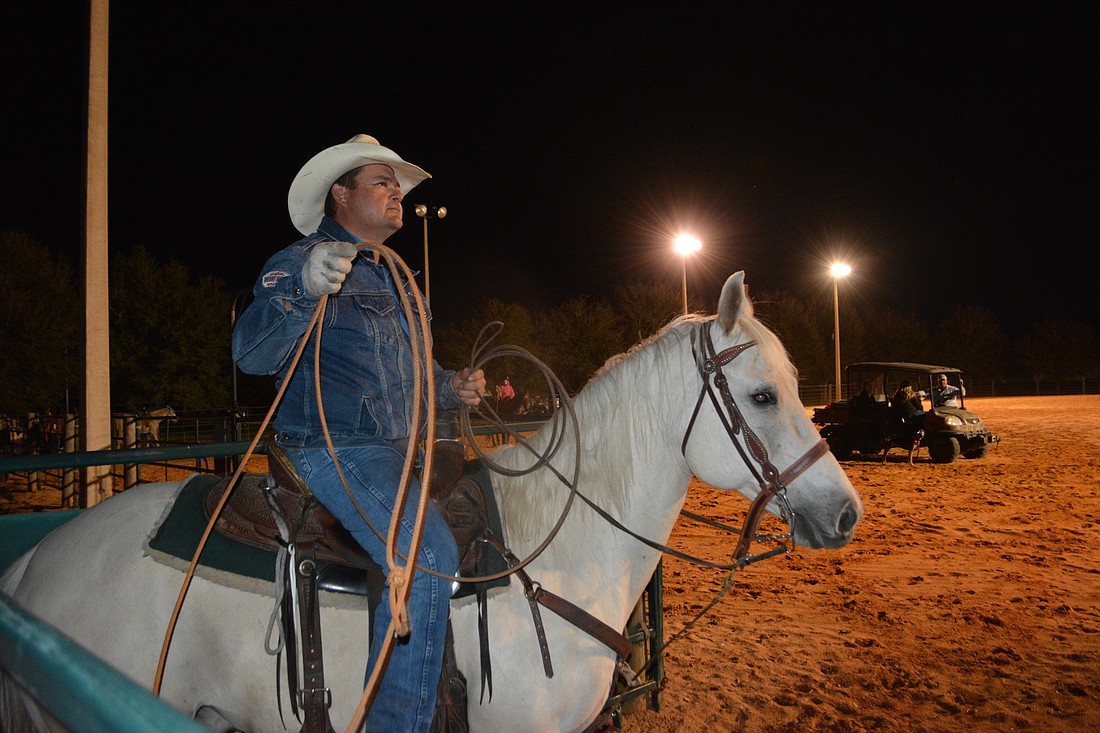 Steve John, the citrus production manager for SMR, works with calves in Lakewood Ranch in preparation for the Ranch Rodeo.