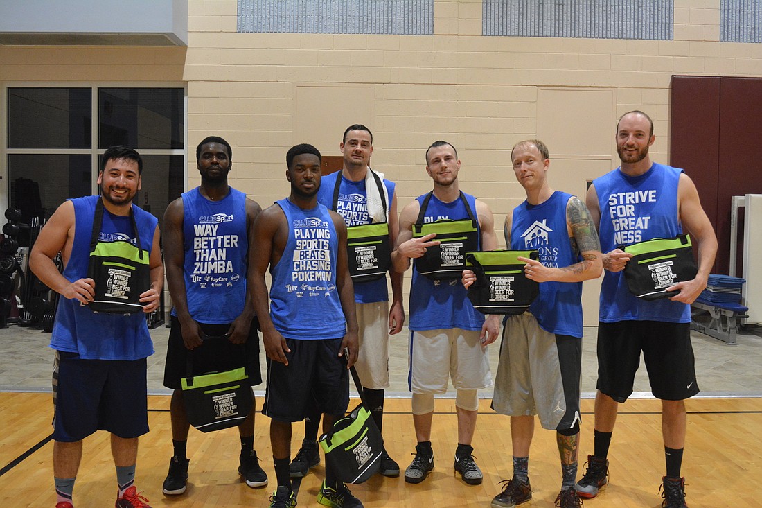 The TuneSquad poses with its championship bags.