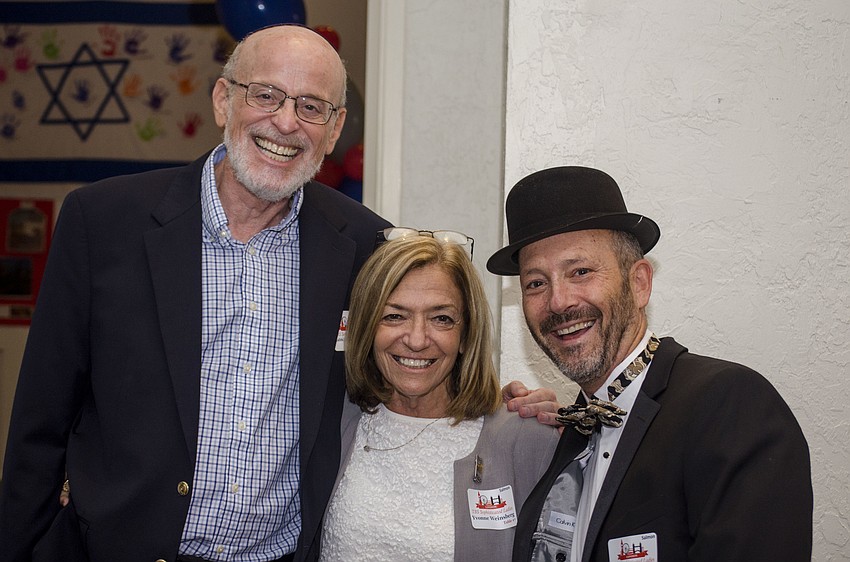 Ed Weinsberg and Yvonne Weinsberg and Temple Beth Sholom Co-President Rob Katz.