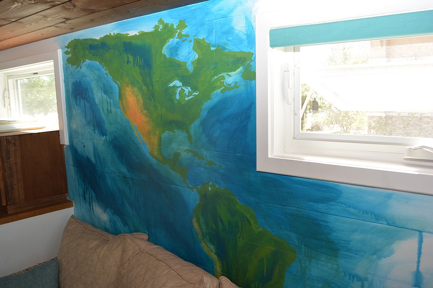 Tim Davidson decorated the interior of the Tiny House with this map. He will draw lines on the map to follow their 50-city tour.