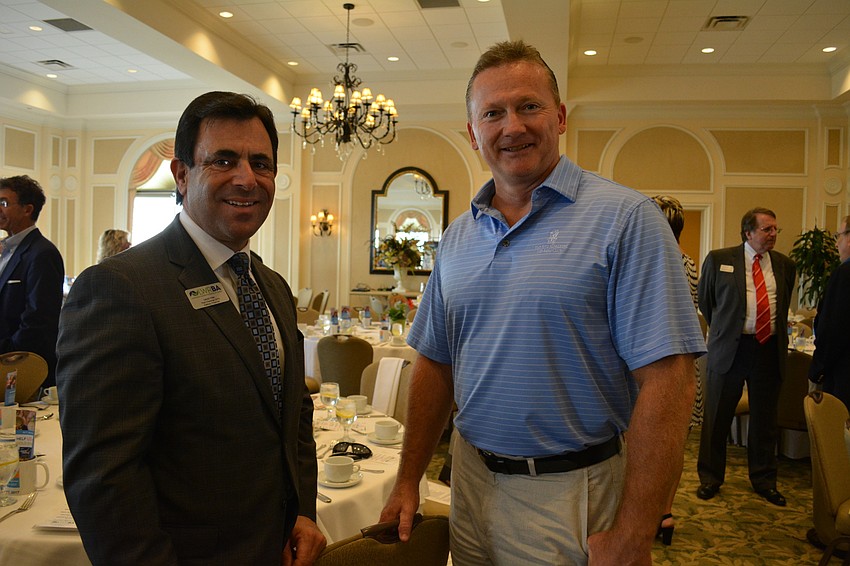 David Fink, of Halliday Financial, with Clint Kasten, of Suncastle Properties