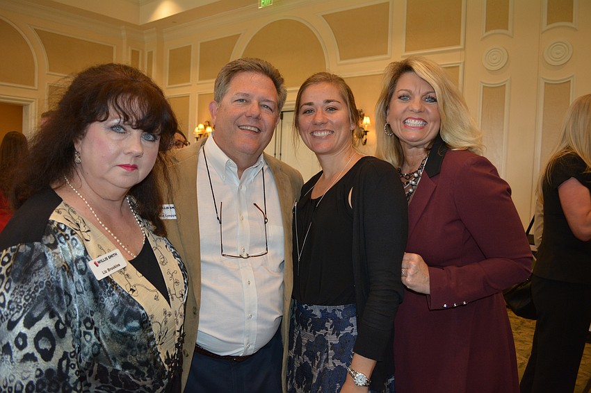 Liz Brookins, Bruce Loeppke, Beth Oldiges and Peggy Kronus are with Willis Smith Construction.