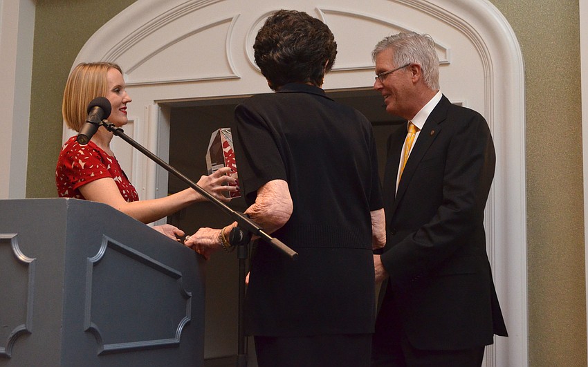 SPARCC President and CEO Jessica Hays presents Honoree Guy W. Peterson with his award alongside SPARCC Founder Jean Gay.