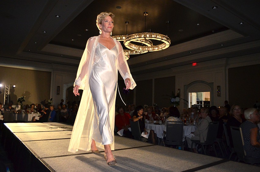 Honorary Chairwoman Kimberley Carreiro hits the runway during the fashion show at The Ritz-Carlton, Sarasota on Feb. 16.